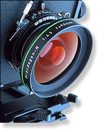 Clipart of a section of a monorail camera such as a Linhof, this view shows the lens and shutter details, Click here to get more Free Clipart at ClipartPal.com